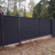 Откатные ворота из профнастила горизонтальная обшивка механические на ж/б